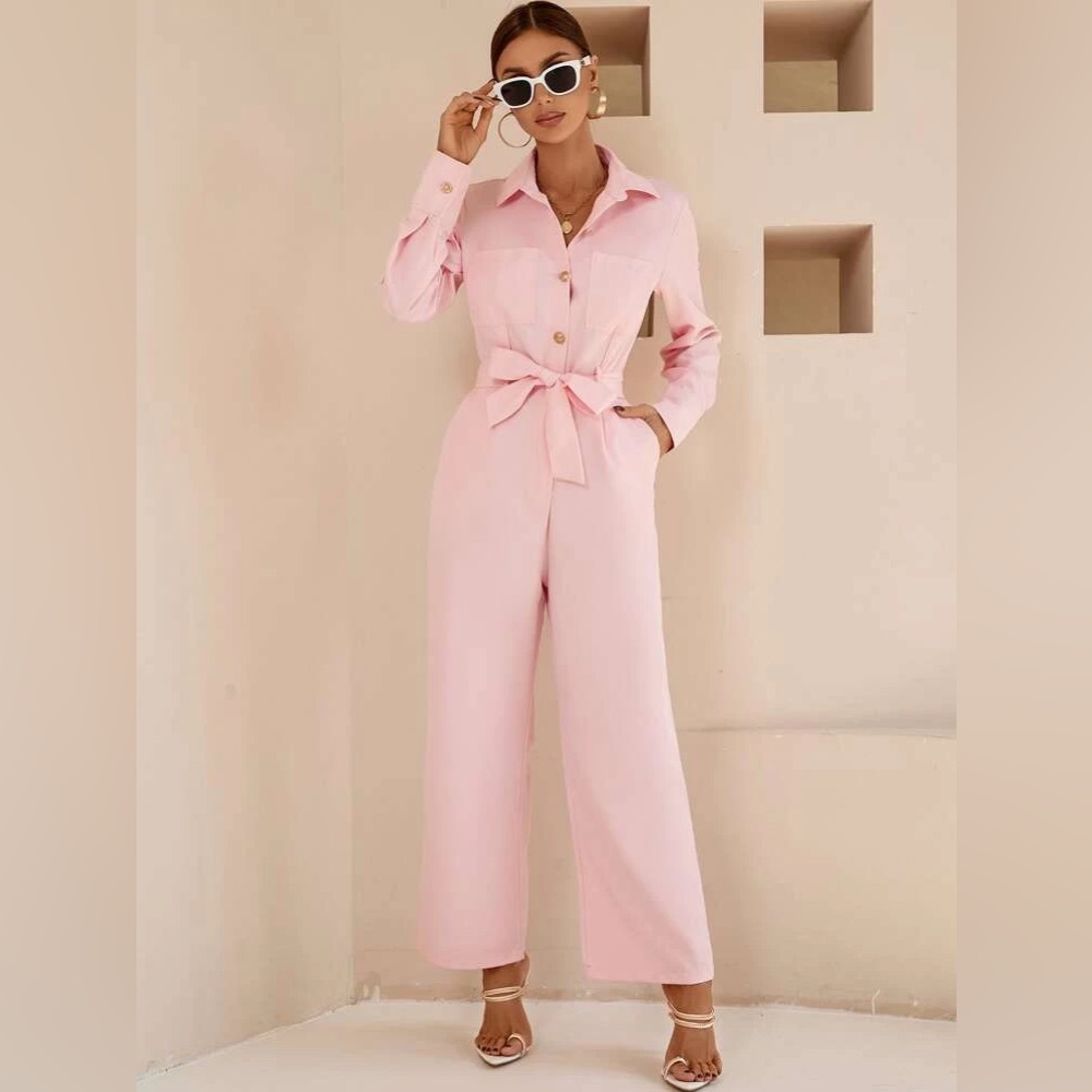 Dual pocket belted jumpsuit.